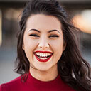 closeup photography of woman smiling - not actual representation of customer